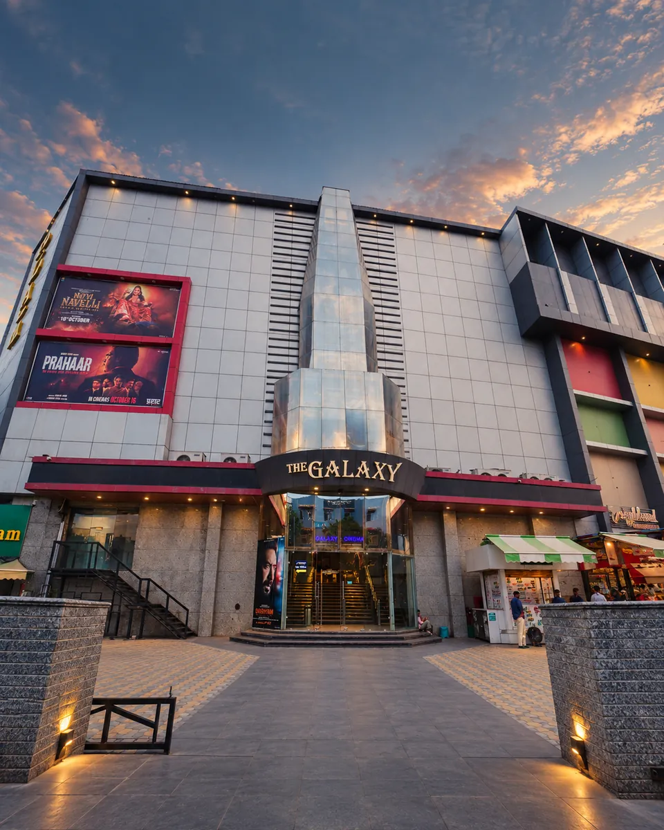 The Galaxy Cinema building at dusk with THE GALAXY sign above the entrance